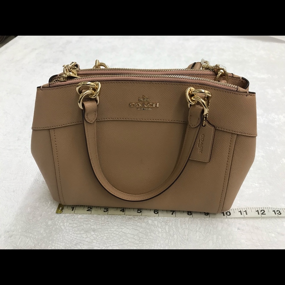 Coach blush pocketbook.